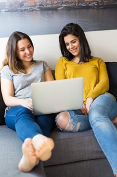 Beautiful young women at home studying for the final exams