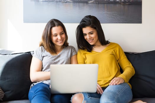 Beautiful young women at home studying for the final exams