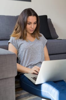 Beautiful woman relaxing with a computer