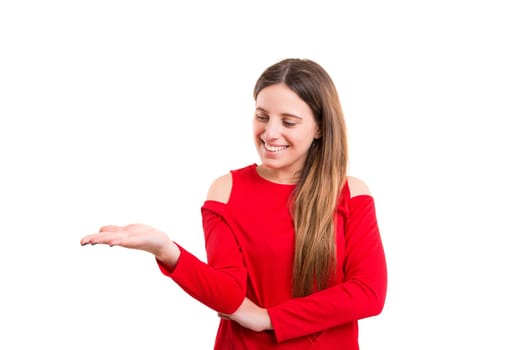 Young beautiful woman presenting your product, isolated over white background