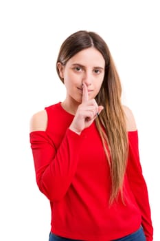 Beautiful young woman asking for silence isolated