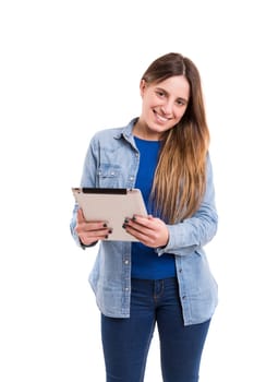 Beautiful woman relaxing with a tablet computer
