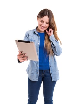 Beautiful woman relaxing with a tablet computer