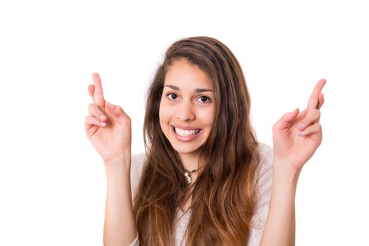Woman with crossed fingers, isolated over a white background