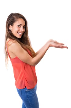 Young beautiful woman presenting your product, isolated over white background