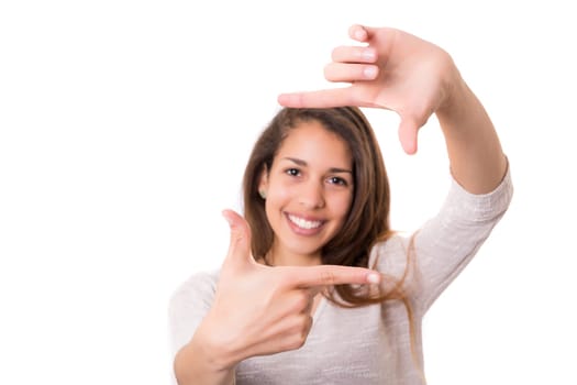 Young woman making framing key gesture - isolated over white