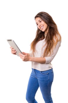 Beautiful woman relaxing with a tablet computer