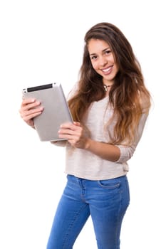 Beautiful woman relaxing with a tablet computer