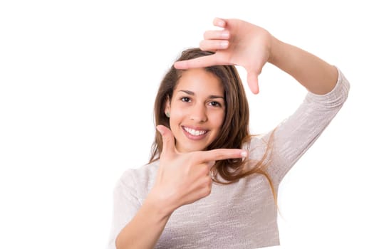 Young woman making framing key gesture - isolated over white