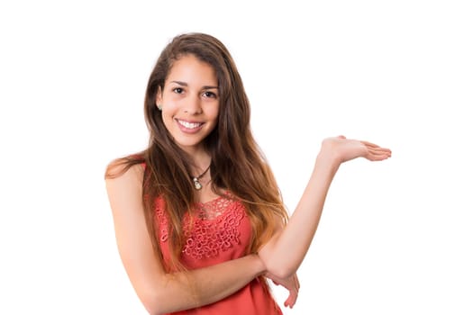 Young beautiful woman presenting your product, isolated over white background