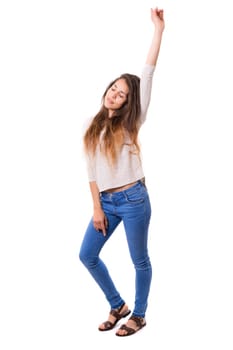 Studio shot: Happy woman with raised arms