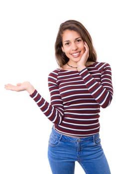 Young beautiful woman presenting your product, isolated over white background