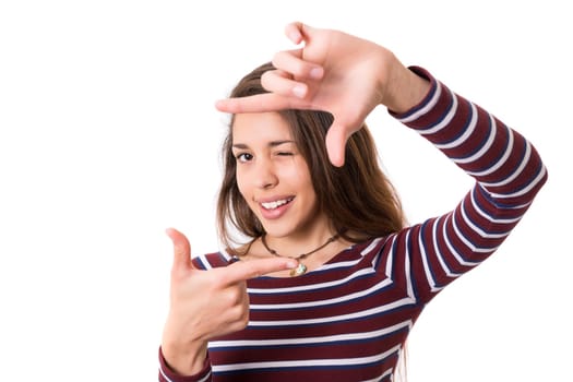 Young woman making framing key gesture - isolated over white