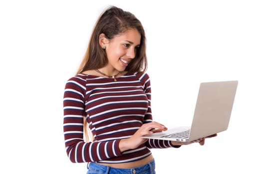 Young student working with her laptop, isolated over a white background