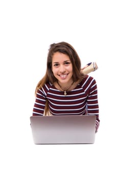 Young student working with her laptop, isolated over a white background