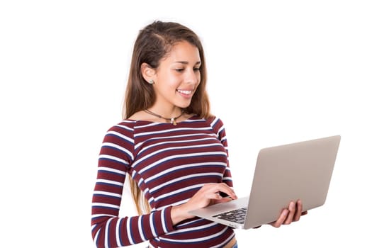 Young student working with her laptop, isolated over a white background