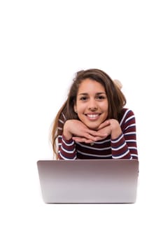 Young student working with her laptop, isolated over a white background