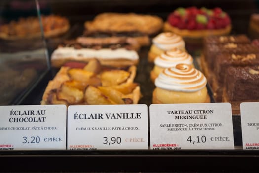 Local patiserie in Paris showing the typical french pastries