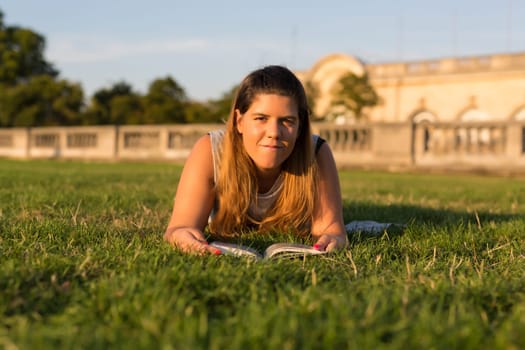 Lucky girl relaxing in the gardens next to the Invalides and the Alexander the 3rd bridge in Paris