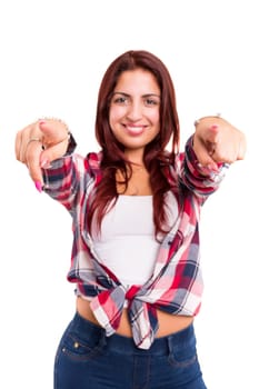 Young beautiful woman pointing at you, isolated over white