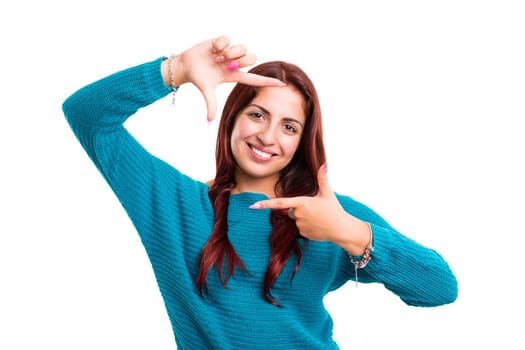 Young woman making framing key gesture - isolated over white