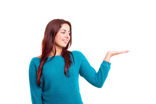 Young beautiful woman presenting your product, isolated over white background