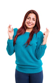Woman with crossed fingers, isolated over a white background