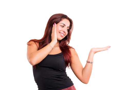 Young beautiful woman presenting your product, isolated over white background