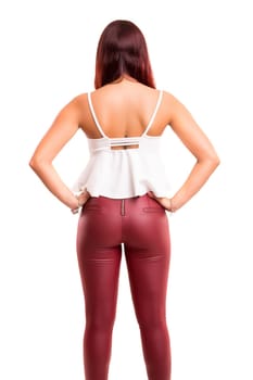 Woman posing with her back faced to camera, isolated over copy space background