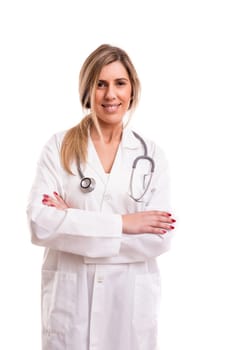 Beuatiful young medic posing isolated over a white background