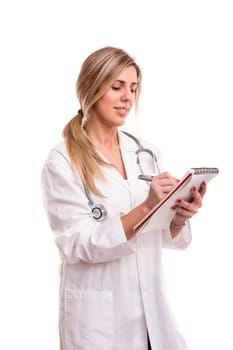 Beuatiful young medic posing isolated over a white background