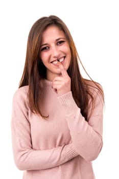 Beautiful young woman asking for silence isolated