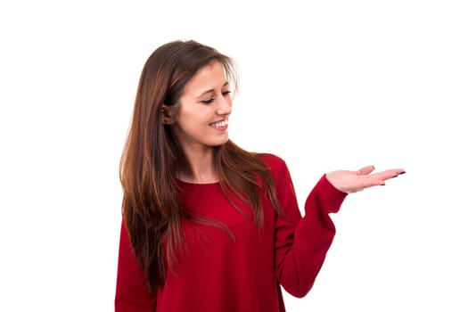 Young beautiful woman presenting your product, isolated over white background