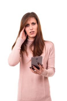 Young beautiful woman at the phone, isolated over a white background