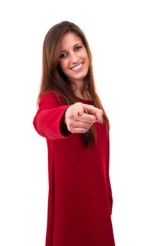 Young beautiful woman pointing at you, isolated over white