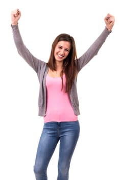 Studio shot: Happy woman with raised arms