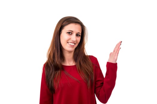 Young beautiful woman presenting your product, isolated over white background