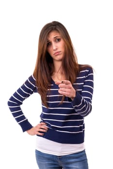 Studio shot of a young angry woman pointing at you, isolated over white