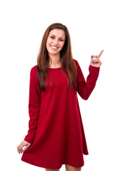 Young beautiful woman presenting your product, isolated over white background