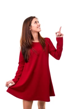 Young beautiful woman presenting your product, isolated over white background