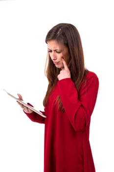 Beautiful woman relaxing with a tablet computer