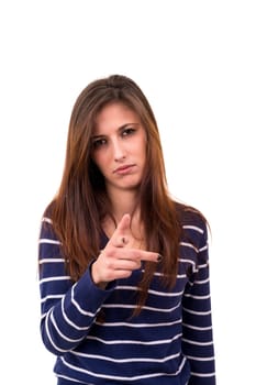 Studio shot of a young woman signaling thumbs down