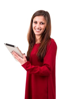 Beautiful woman relaxing with a tablet computer