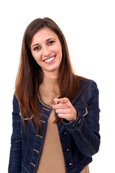 Young beautiful woman pointing at you, isolated over white