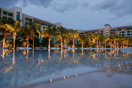 ANTALYA, TURKEY - December 11, 2020: Exterior, building and swimming pool of Regnum Carya Golf and SPA resort