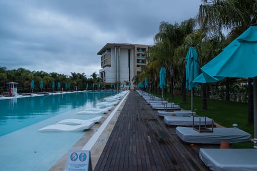 ANTALYA, TURKEY - December 11, 2020: Exterior, building and swimming pool of Regnum Carya Golf and SPA resort