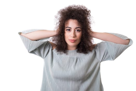 Beautiful young woman asking for silence isolated