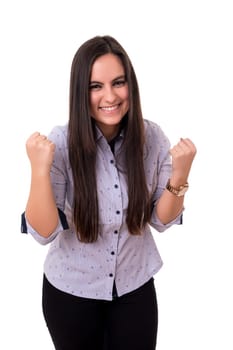 Studio shot: Happy woman with raised arms