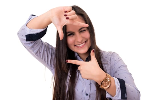 Young woman making framing key gesture - isolated over white