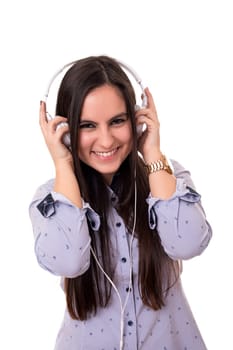A Happy young woman listening to music